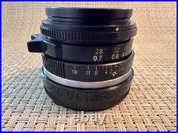 Leica 35mm f/2 summicron 11309 with leitz uva filter excellent